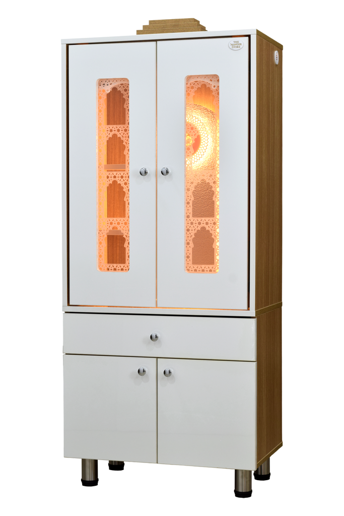 Left side view of home temple with closed pocket doors, dual tone finish, warm LED lighting visible through glass panels