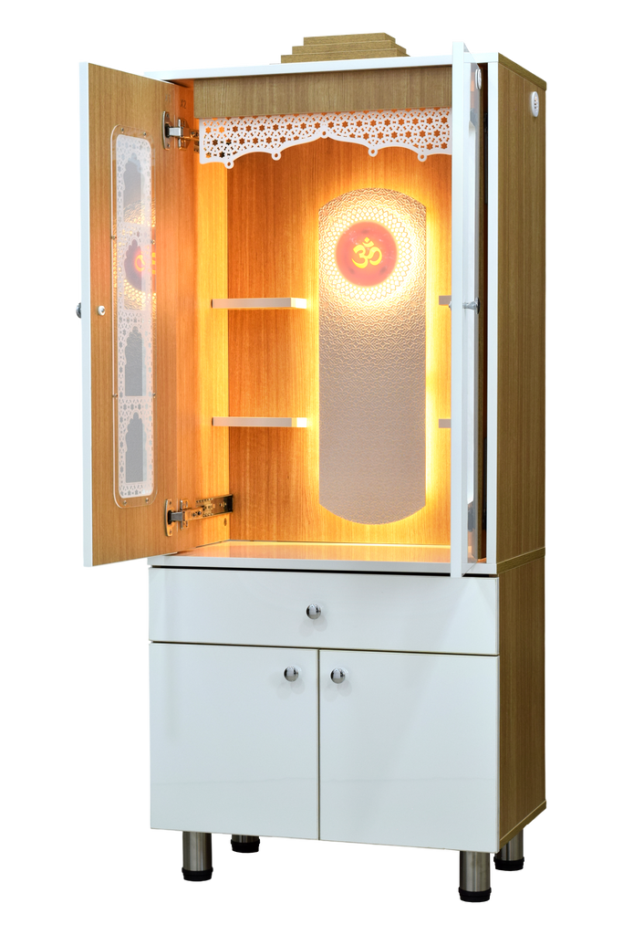 Left side view of mandir with one pocket door partially open, showing teakwood interior with LED lighting, storage cabinet below